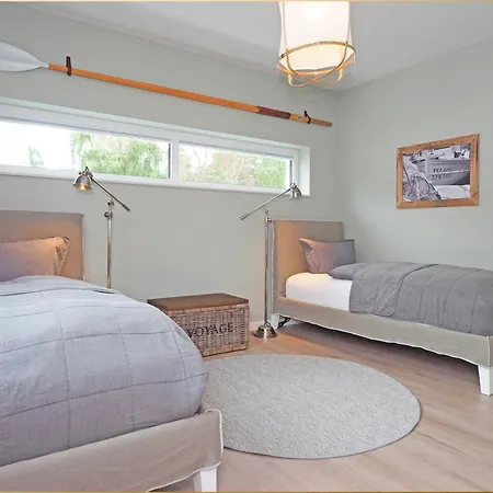 Casa de Férias Stoertebekers Reethus Mit Sauna, Kamin Und E-ladesaeule *